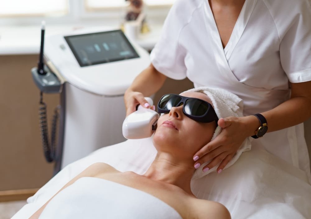 Doctor doing Q-Switched laser procedure
