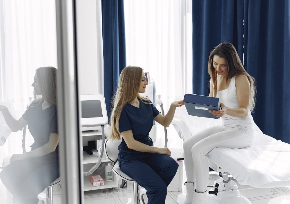 Woman with doctor understanding Q-Switched laser